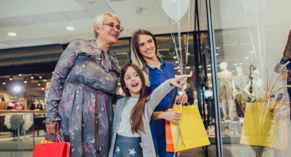 mother-adult-daughter-and-granddaughter-in-shopping-mall-together