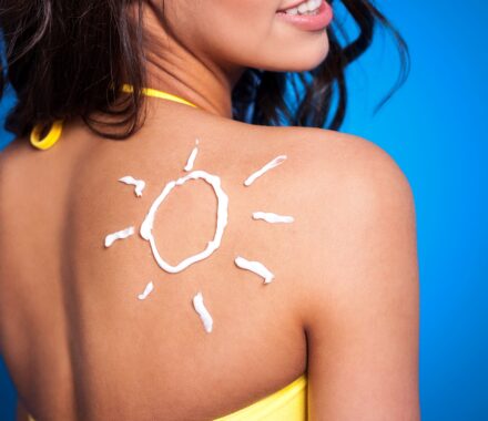suntan-lotion-woman-s-arm-sun-shape