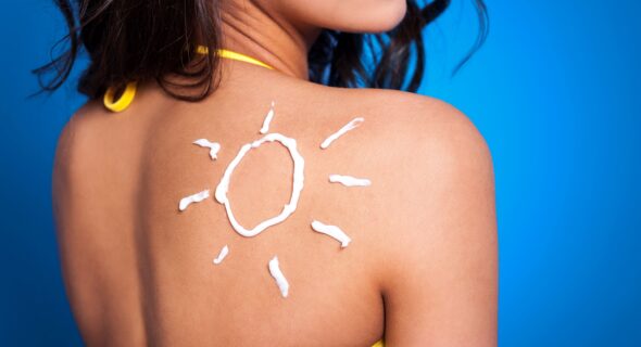 suntan-lotion-woman-s-arm-sun-shape